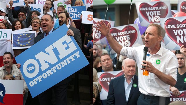 Le premier ministre écossais Alex Salmond et le député en opposition à l'indépendance de l'Écosse Jim Murphy entourés de militants Le premier ministre écossais Alex Salmond et le député en opposition à l'indépendance de l'Écosse Jim Murphy entourés de militants