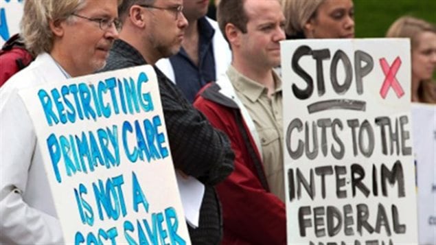 Doctors and healtcare workers took to the streets to protest the government cuts to the IFHP for refugees in 2012