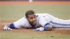  The Blue Jays are hoping Dalton Pompey can provide much-needed speed on the base paths and in centre field this season. We see Pompey flat on his stomach on the ground with his hands outstretched in front of him in a white Jays uniform after reacts sliding safely home during his September call-up last season.