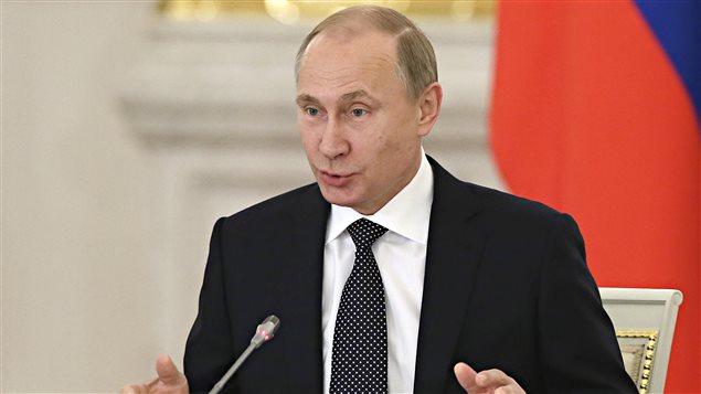 Le président russe Vladimir Poutine, en pleine allocution lors du Conseil présidentiel pour la culture et les arts au Kremlin, le 24 décembre 2014.