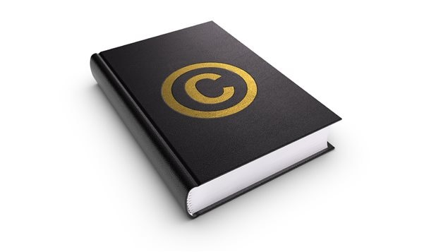 Le symbole du copyright sur la page couverture d'un livre Le symbole du copyright sur la page couverture d'un livre