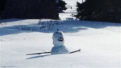 A snowman built over the weekend in Charlottetown, was almost buried after Monday's storm