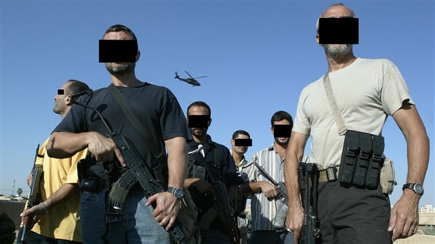 Des mercenaires, membres d'une compagnie de sécurité privée, à Baghdad en 2007 Des mercenaires, membres d'une compagnie de sécurité privée, à Baghdad en 2007