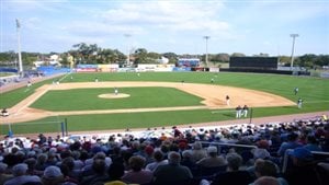 The grass is green and the sky is blue in Florida for Canadians lucky enough to make it to spring training. We see a beautiful baseball diamond from the first base side.