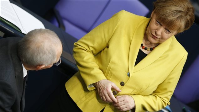 Wolfgang Schäuble y Angela Merkel en la Bundestag.