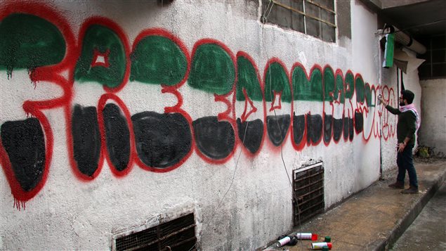عبارة "الحريّة لسوريا" في كتابة على الجدران في حلب في 15 آذار مارس 2015