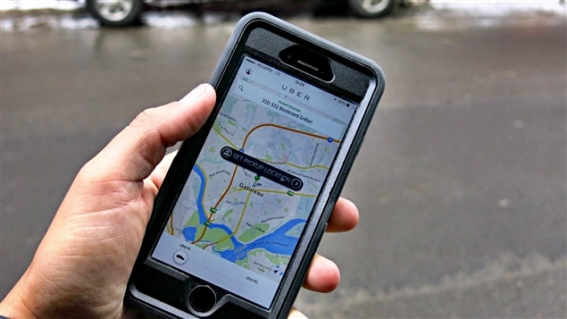 تطبيق على الهاتف الخليوي لخدمة اوبير لسيّارات الأجرة
