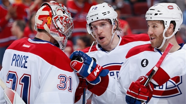 De gauche à droite, Carey Price, Dale Weise et Brandon Prust