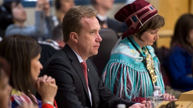 President of the Saami Council, Áile Javo (far left) sits next to Borge Brende, minister of foreign affairs for Norway, during the opening of the Arctic Council Ministerial meeting Friday, April 24, 2015 in Iqaluit, Nunavut.