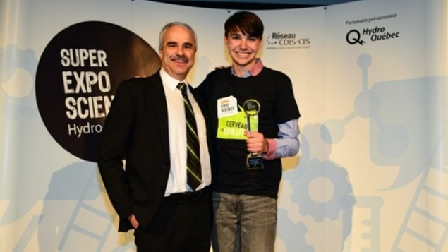 Olivier Cloutier holding his first-place award at the Hydro-Quebec Science expo in mid-April.