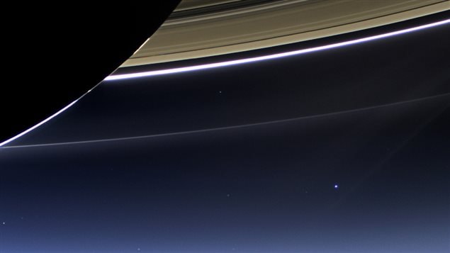 NASA Cassini probe in 2013 sent back this picture of Earth 1.44 billion kilometres away as it passed by Saturn's rings. The Earth is the tiny blue dot with the rare combination of conditions enabling it to support life.