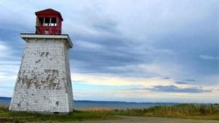 The Church Point lighthouse, which was built in 1874, as it was before its complete destruction in the storm. 