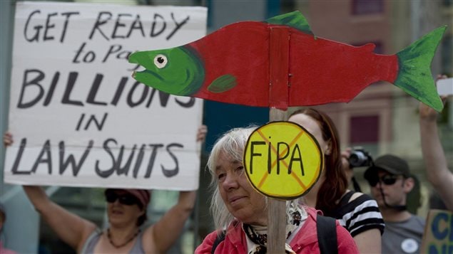 The Hupacasath First Nation challenged the Canada-China Foreign Investment Promotions and Protection Agreement (FIPA) in federal court. This is the scene of a protest outside the federal court where a hearing was held in down town Vancouver, B.C. June 5, 2013. It was ratified in September 2014.