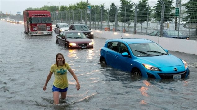 Water flooded the streets of Toronto last July. Flooding is one of the hazards that are expected to increase because of climate change.