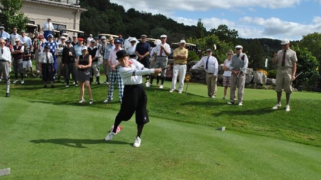 Norm Moreau, one of the original founders of the Golf Historical Society of Canada teeing off at the 25th anniversary celebration at Dundas Valley Golf and Curling Club, July 2013, dapper in period clothes