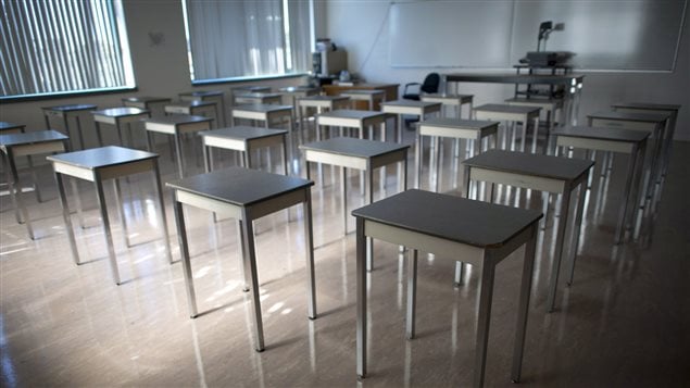 It hasn't come to this yet, but more students are skipping class for homeschooling. We see an empty classroom with empty desks. 