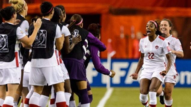 Canada's Ashley Lawrence, No. 22, celebrates her goal with team mates during the World Cup Group A match against the Netherlands at Olympic Stadium on June 15 in Montreal.