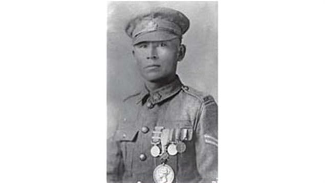 Francis Pegahmagabow shortly after the end of the war wearing his many medals