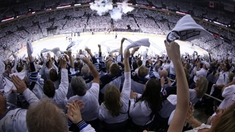 Fans pack the arean in Winnipeg on April 20, 2015 as the Winnipeg Jets played the Anaheim Ducks in game 3 of the playoffs. Hockey is Canada's official winter sport, however, it seems many Canadians now are not so obsessed about the game according to poll results