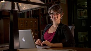 Jessica Steinberg (PhD, ASECS fellow) at the McMaster University library ancient books collection in Hamilton Ontario