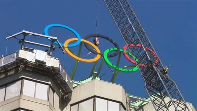 The rings were raised the 20 storeys, tonight they will light up in the night sky joining Athens and the IOC head offices in Switzerland, as the only places to display them permanently.