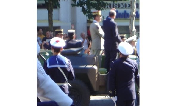 2003 French President Jacques Chirac on the Champs Elysee in Paris in an open military vehicle, almost exactly as would have been seen by the would be assassin the previous year.