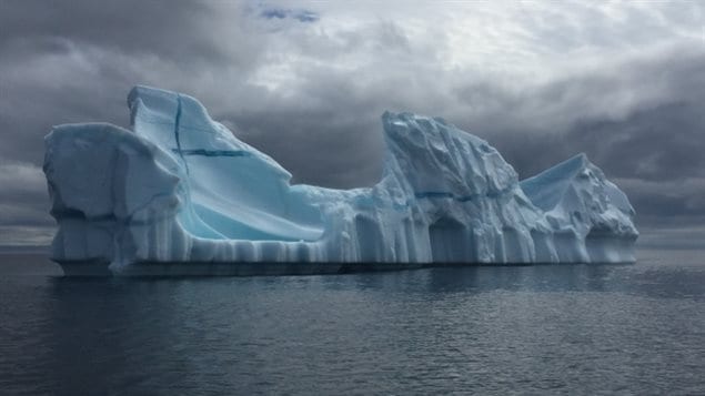 This iceberg in Conception Bay off Canada’s eastern coast rolled over moments after the photo was taken.