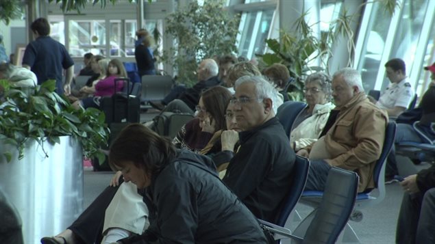 Many people spent hours waiting in St. John's International Airport Tuesday for flights that were diverted to Gander and Deer Lake.