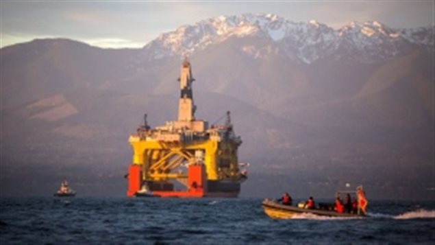 The massive Polar Pioneer drilling rig arrives in Part Angeles Washington on April 17 after crossing the Pacific on a special transport ship The Shell rig has permission to drill in the Chukchi Sea this summer