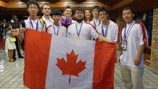 Canada's 'mathletes', left to right: Jinhao (Hunter) Xu, James Rickards (Observer), Kevin Sun, Jacob Tsimerman (Leader), Zhuo Qun (Alex) Song,  Lindsey Shorser (Deputy Leader), Alexander Whatley, Michael Pang, Yan (Bill) Huang. The Canadian team ranked 9th and Alex Song came 1st.
