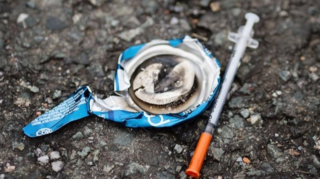 Drug users sharing needles risk hepatitis C infection.