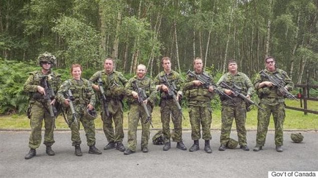 Sgt. Tatyana Danylyshyn, second from left, with some of the other members of the Canadian team at the Bisley shooting competition.