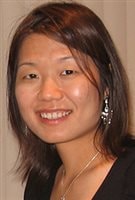 Dr. Maria Chiu led the study that uncovered varying health trends for members of different ethnic groups. She is facing the camera in what appears to be a black evening dress. She wear large, silver earings and a lovely smile below her dark, penetrating eyes and shoulder-length brown hair.