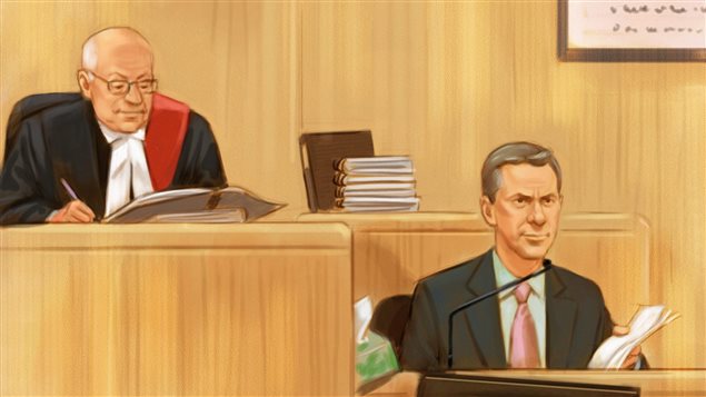 In this artist's sketch, Nigel Wright, right, testifies Thursday at the Mike Duffy trial as Justice Charles Vaillancourt looks on. The sketch has Wright sitting in the right foreground in the witness box. He is dressed in a dark suit with his tie in a windsor knot. He holds a some papers in his left hand. Behind him, the judge sits on his bench in a black and red robe with a white ascot-like tie, holding a pen in his right and what appears to be a binder in his right hand. He is bald with a trim of white hair and wears glasses. Five law books are stacked to the judge's left and behind Wright's head.