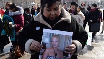 Sharon Armstrong takes part in a vigil for Loretta Saunders in front of Parliament on March 5, 2014. This was one of several demonstrations asking for a national inquiry into missing and murdered aboriginal women.