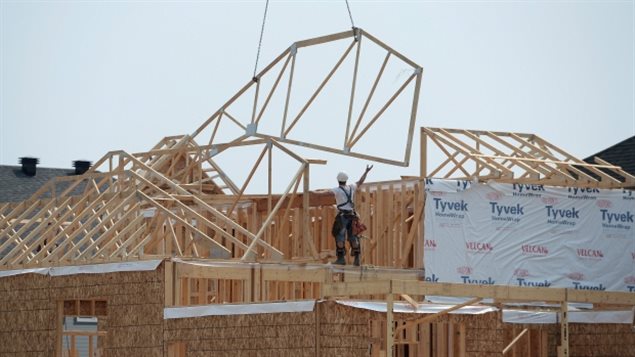 Construction workers build new homes in Ottawa this month. The 90 or so days until election day will be filled with economic news, which the political parties will each try to mould to their advantage.