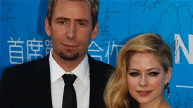 Avril Lavigne and her rocker husband Chad Kroeger, are seen attending the Huading Awards ceremony in Macau in 2013. The music world couple announced they've separated. 