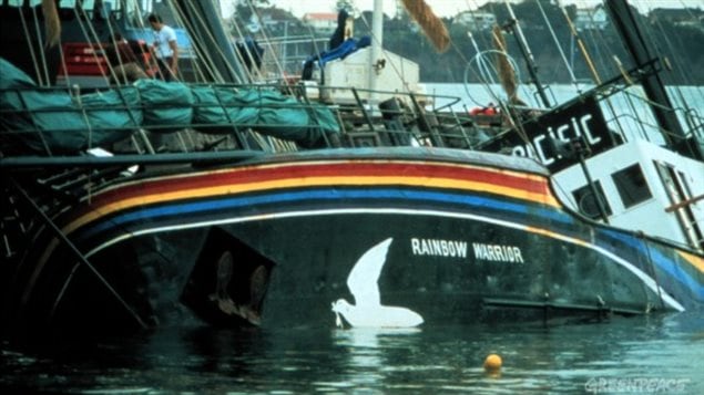 The original Rainbow Warrior was sunk by French  scuba commandos in July 1985 in New Zealand. The ship was about to lead a flotilla to Moruroa Atoll to protest French nuclear tests. The commandos planted two bombs below the waterline. A Portuguese photographer was killed in the bombing.