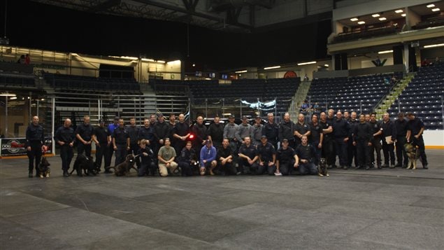 Group photo of handlers and dogs at the 2015 Canadian Police Canine Assoc trials in Medicine Hat, Alberta