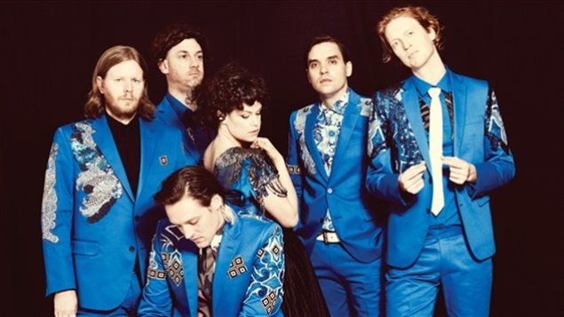 Arcade Fire's co-founders, Win Butler and Régine Chassagne, (centre) are part of a group looking to open a restaurant in Montreal..