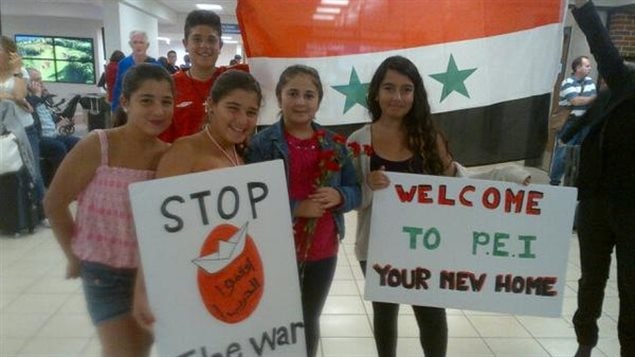 Familia siria a su llegada a la Isla del Príncipe Eduardo, Canadá