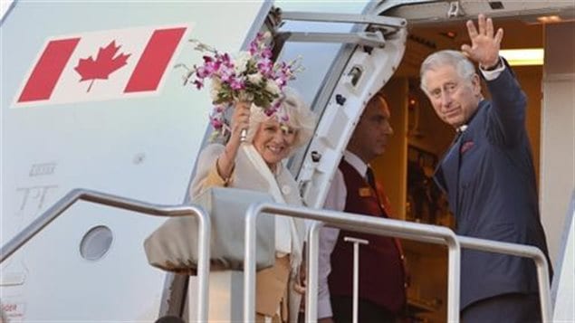 Prince Charles and Camilla, Duchess of Cornwall boarding a Canadian Forces to return to England jet following their tour of Canada in 2014