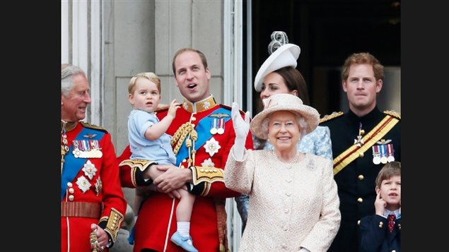 Queen Elizabeth II marks her ceremonial birthday during the Trooping the Colour parade at Buckingham Palace with Prince Charles, Prince Willian holding Prince George, Catherine, the Duchess of Cambridge and Prince Harry on June 13, 2015. The Queen became the longest serving British monarch this year, but there is no indication she would step aside in favour of Prince Charles, or that he would do the same in favour of the more popular Prince William