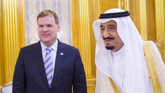 In this photos provided by the Saudi Press Agency, Crown Prince Salman bin Abdulaziz Al Saud, right, meets Canadian Minister of Foreign Affairs John Baird in his office in Jiddah, Saudi Arabia, Thursday, Oct. 16, 2014. The two discussed bilateral relations and regional and international events.