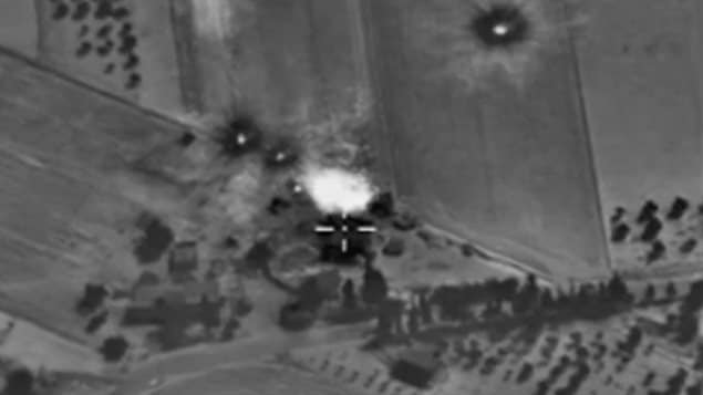 This aerial shot from Russia’s defence department website is said to show a bomb explosion in Syria. Russia’s president says he is targeting Islamic State militants but some activists say he has hit rebel groups against the Assad regime.