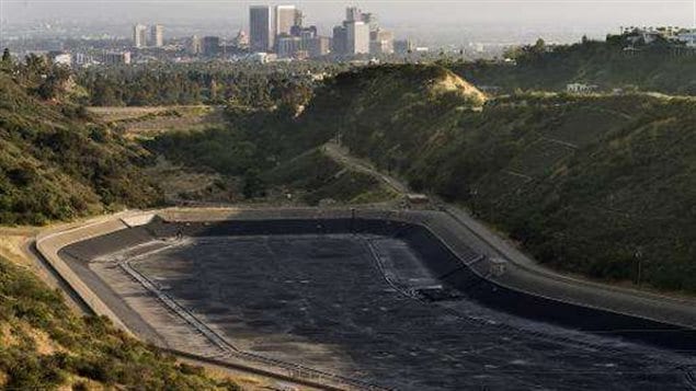 An empty water reservoir is seen in the hills above Los Angeles as a severe drought continues to affect the state of California on April 5, 2015