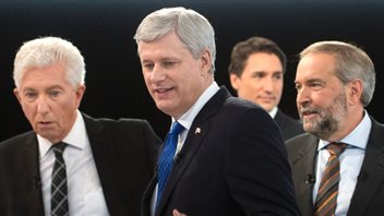 Outgoing Prime Minister Stephen Harper (centre) refused to participate in the traditional wide-ranging debate carried on major TV networks. Other party leaders agreed to smaller debates.