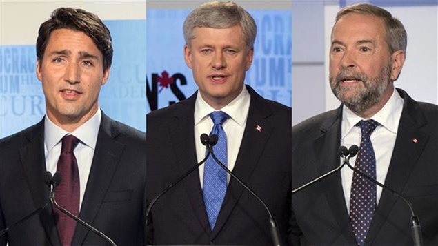 Justin Trudeau (PLC), Stephen Harper (PCC) et Thomas Mulcair (NPD)