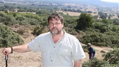 Frank Gogos, and fellow researcher David Mercer together spent years careful examination of archives, photos and maps, has correctly identified the location of Caribou Hill, Suvla Bay where this photo of Mr Gogos was taken.