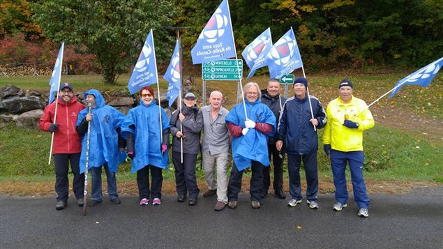 The group of marchers with a couple of local supporters along the way, shown on October 9. A little rain didn't slow the marchers who covered between 30 - 40km a day during the march to Ottawa